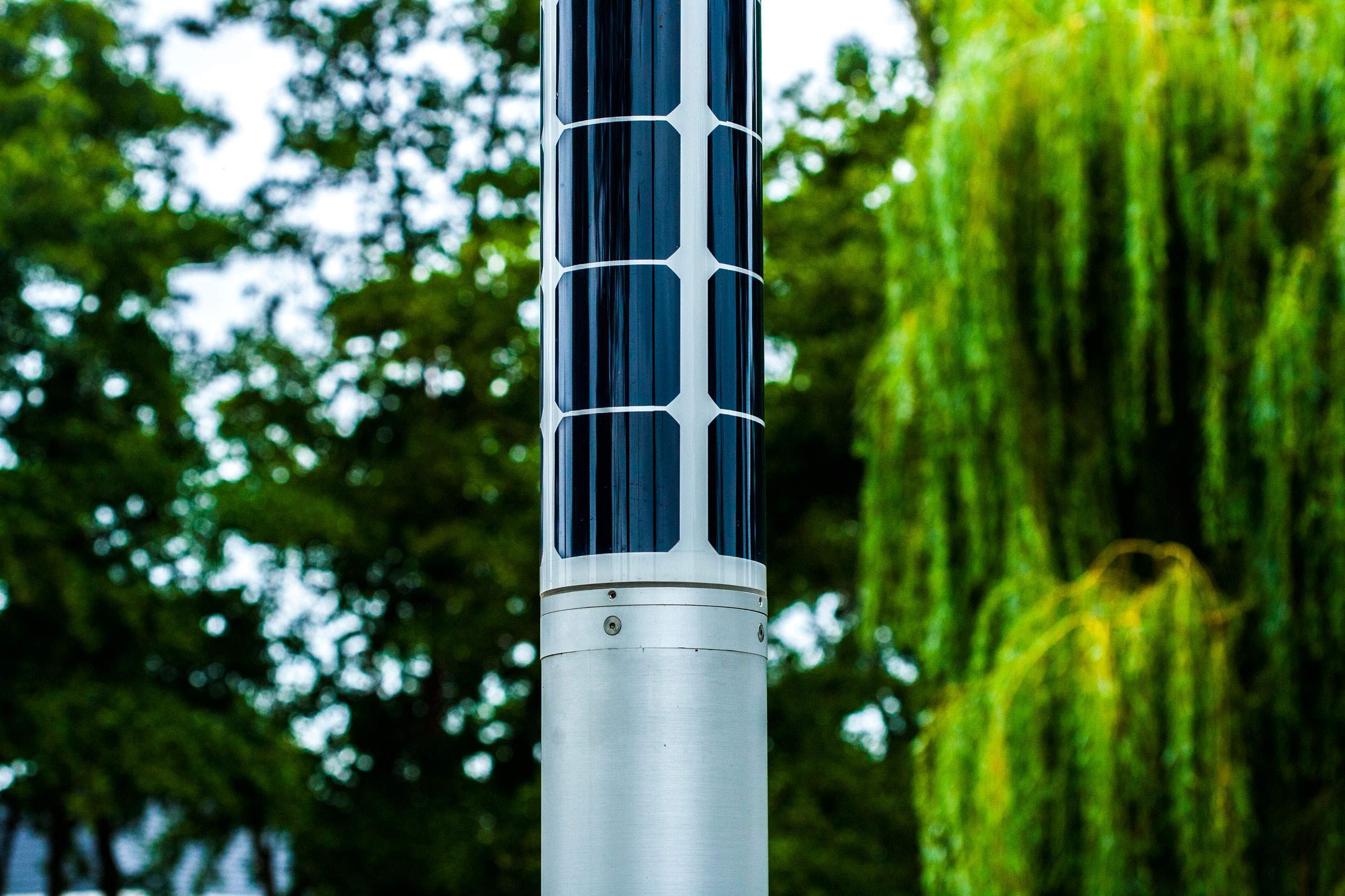 Soluxio solar landscape lighting with detail of cylindrical solar panel