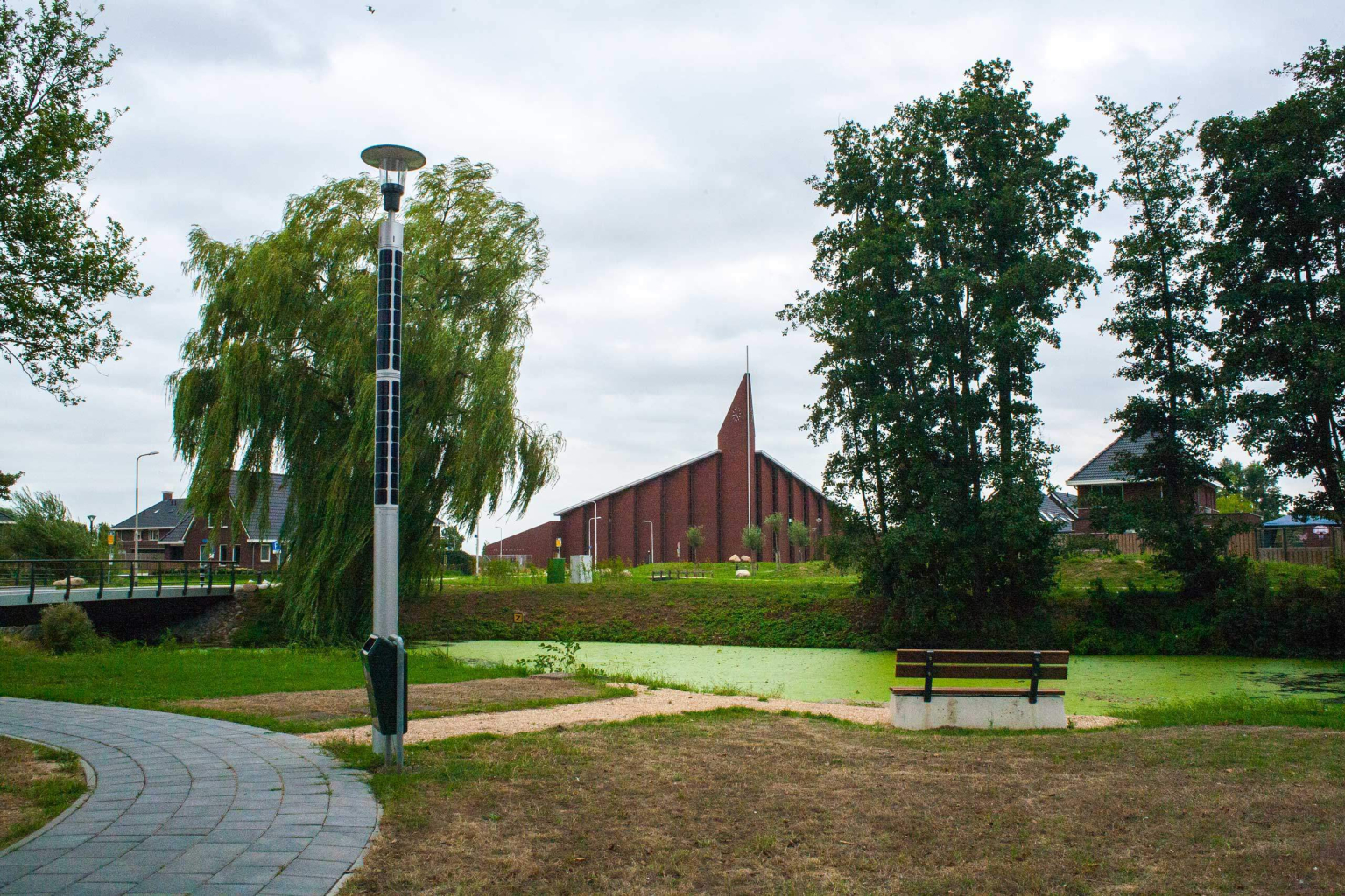 Soluxio solar landscape lighting in park with bench and a view Soluxio solar landscape lighting in park with bench and a view