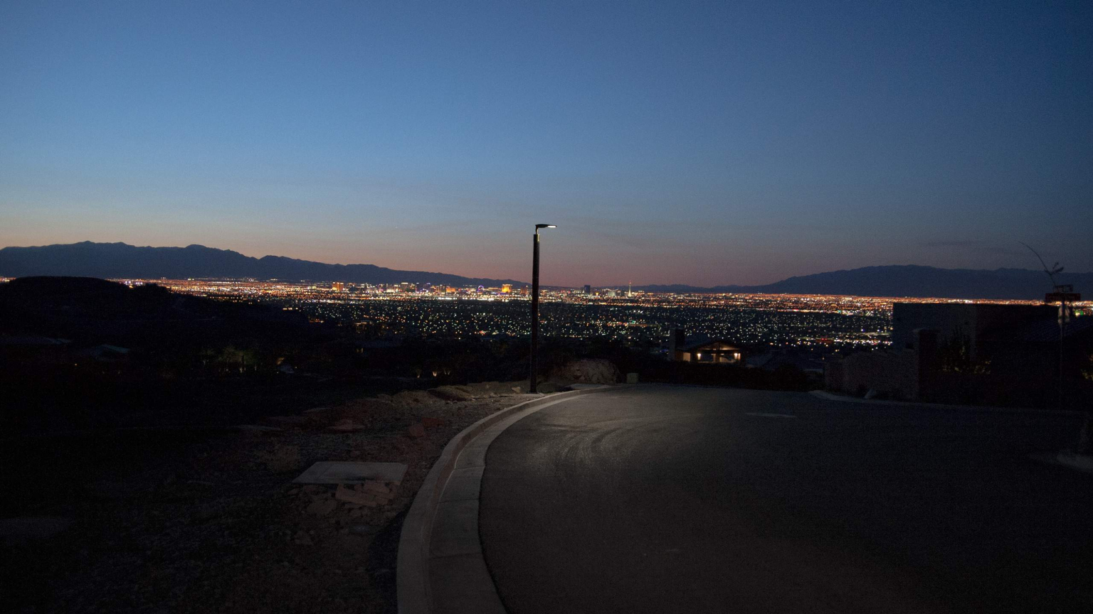 Soluxio solar pathway lighting during night with view on smart city Las Vegas Soluxio solar pathway lighting during night with view on smart city Las Vegas