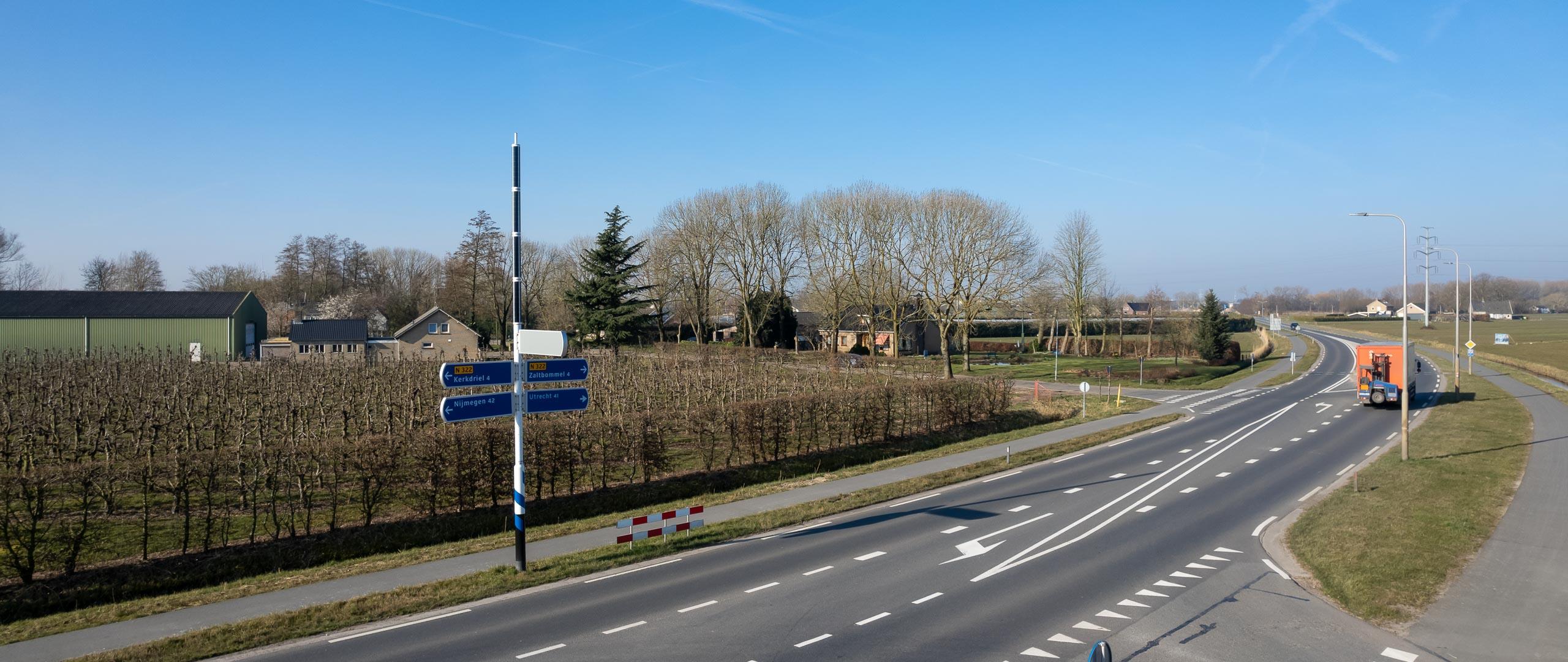 The Soluxio solar illuminated road sign post at intersection in the Netherlands