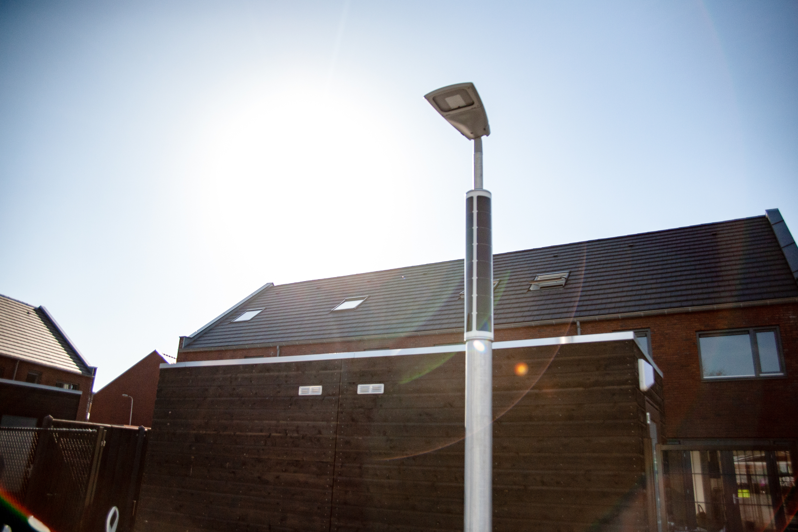 solar-powered-parking-lot-lighting-in-the-sunlight-2 Solar-powered parking lot lighting by Soluxio illuminated under bright sunlight.