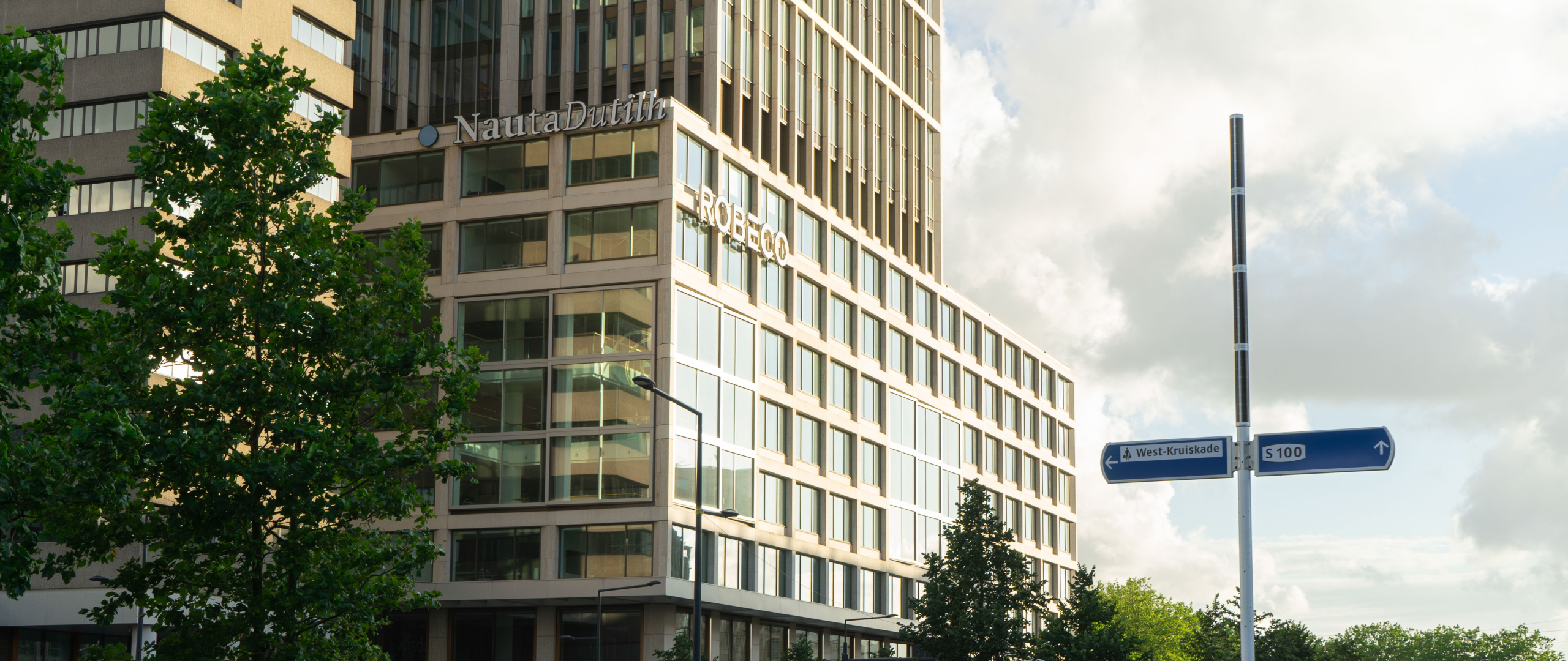 Soluxio Solar-Powered Road Sign at Rotterdam Central Station at Sunset The Soluxio solar illuminated road sign post at intersection in the Netherlands